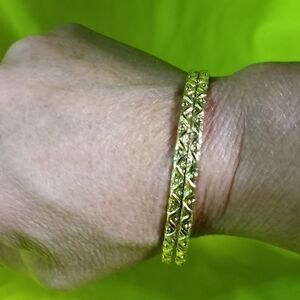 Pair goldtone decorative Bangle bracelets